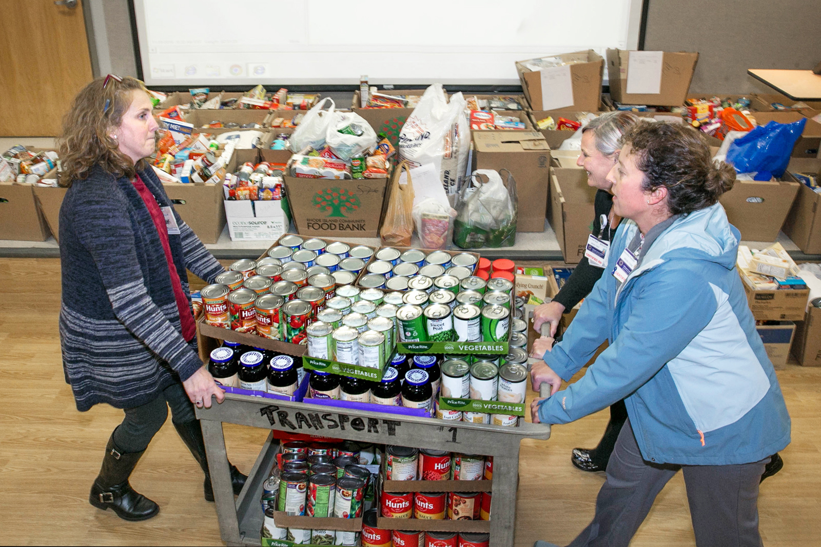 Photo of staff with donated food